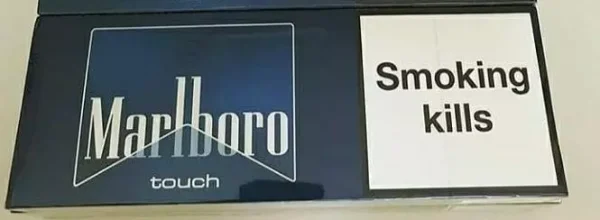 Marlboro Touch Blue Sigara paketi, klasik tütün tadı ve dokunmatik aroma seçeneği ile dikkat çekiyor.