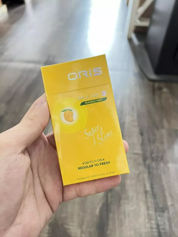 Oris Pulse Mango Mint Superslim Sigara, tatlı mango ve ferahlatıcı nane aromasının mükemmel birleşimiyle harika bir içim deneyimi sunar. İnce yapısı ve şık tasarımıyla zarif bir seçenek oluşturur.